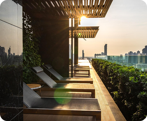 Elegant modern hotel exterior at sunset